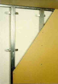 Plasterboards fixed to metal sections